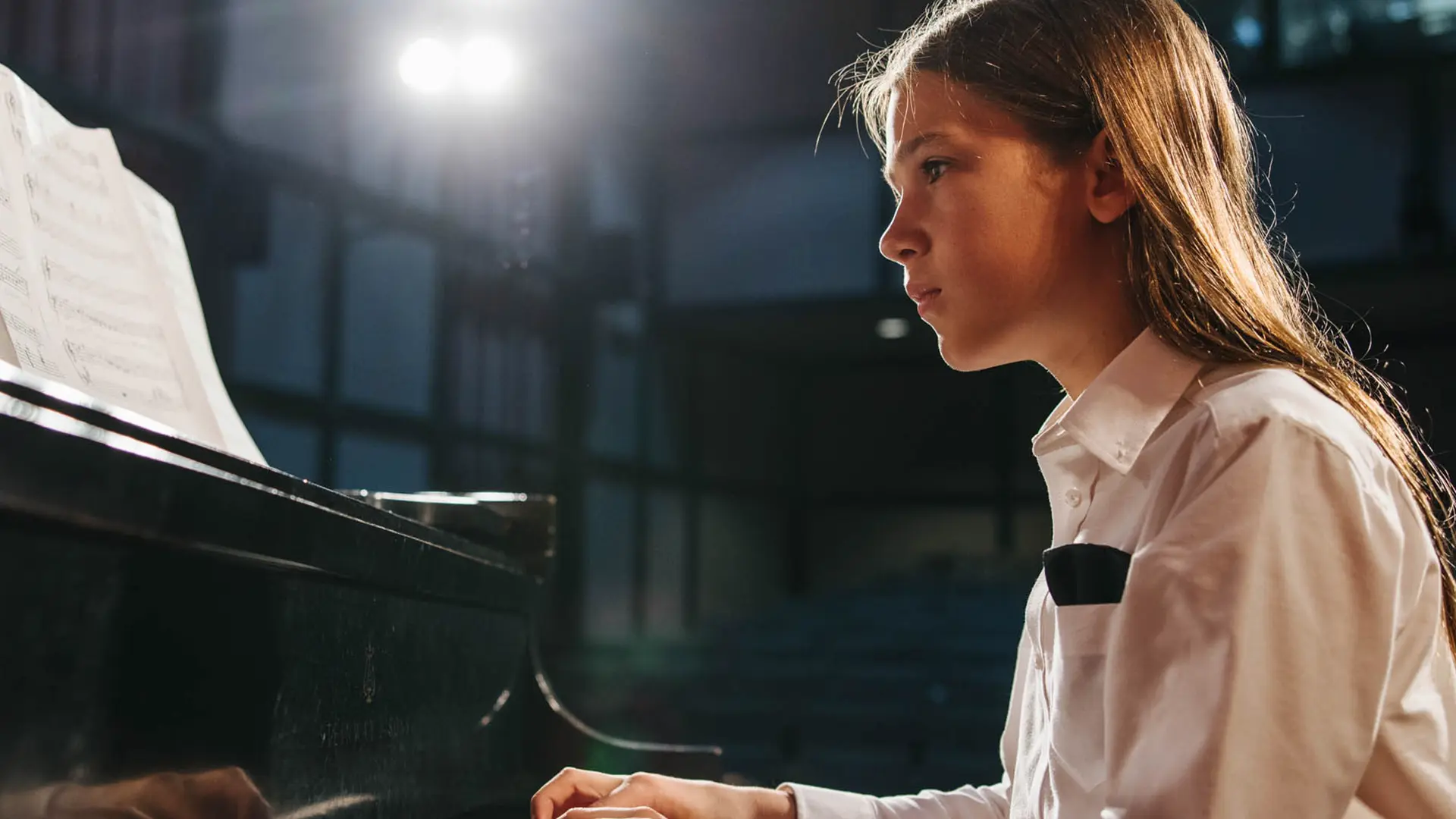 One-on-one piano lesson in a home or studio setting