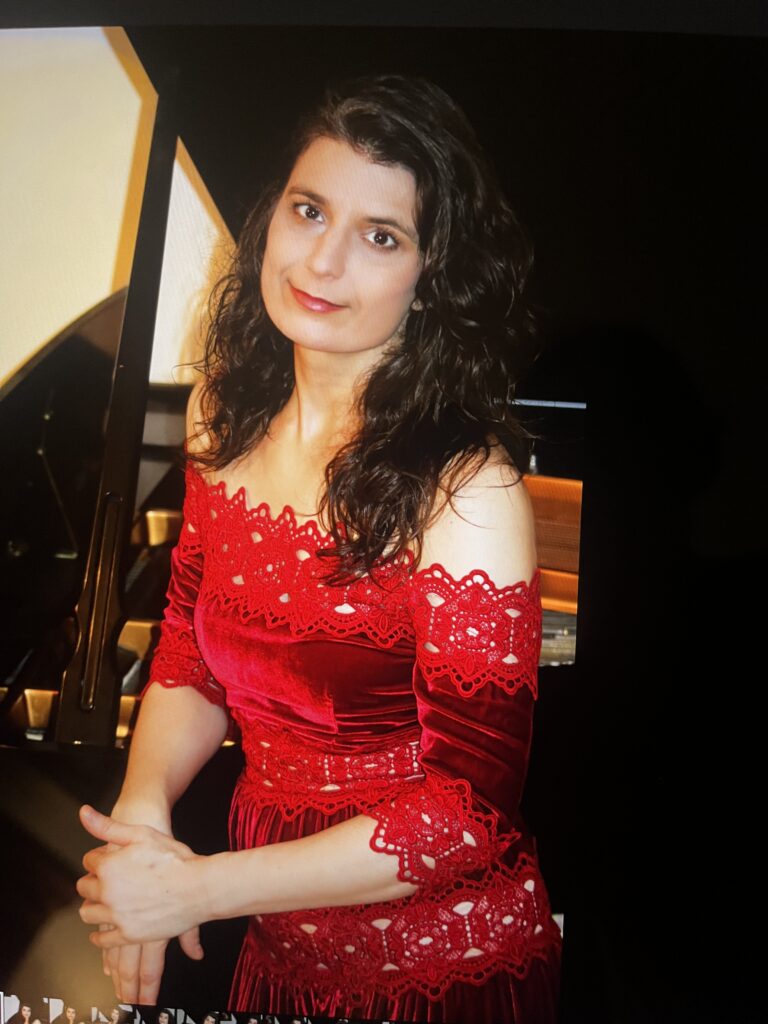 Mira G. (piano) Vertical Photo