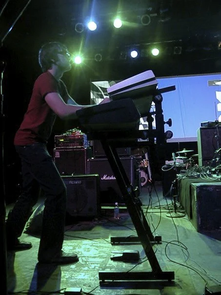 Ross L. (piano) Vertical Photo