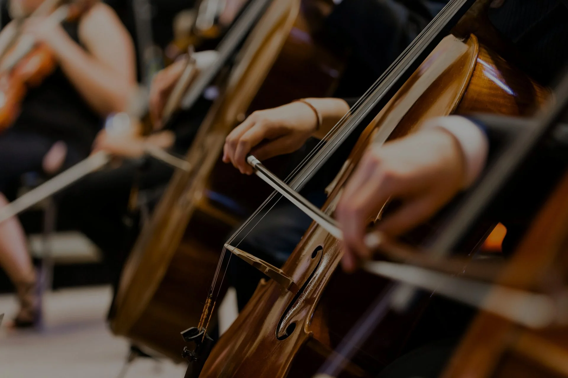 Musician performing on a cello