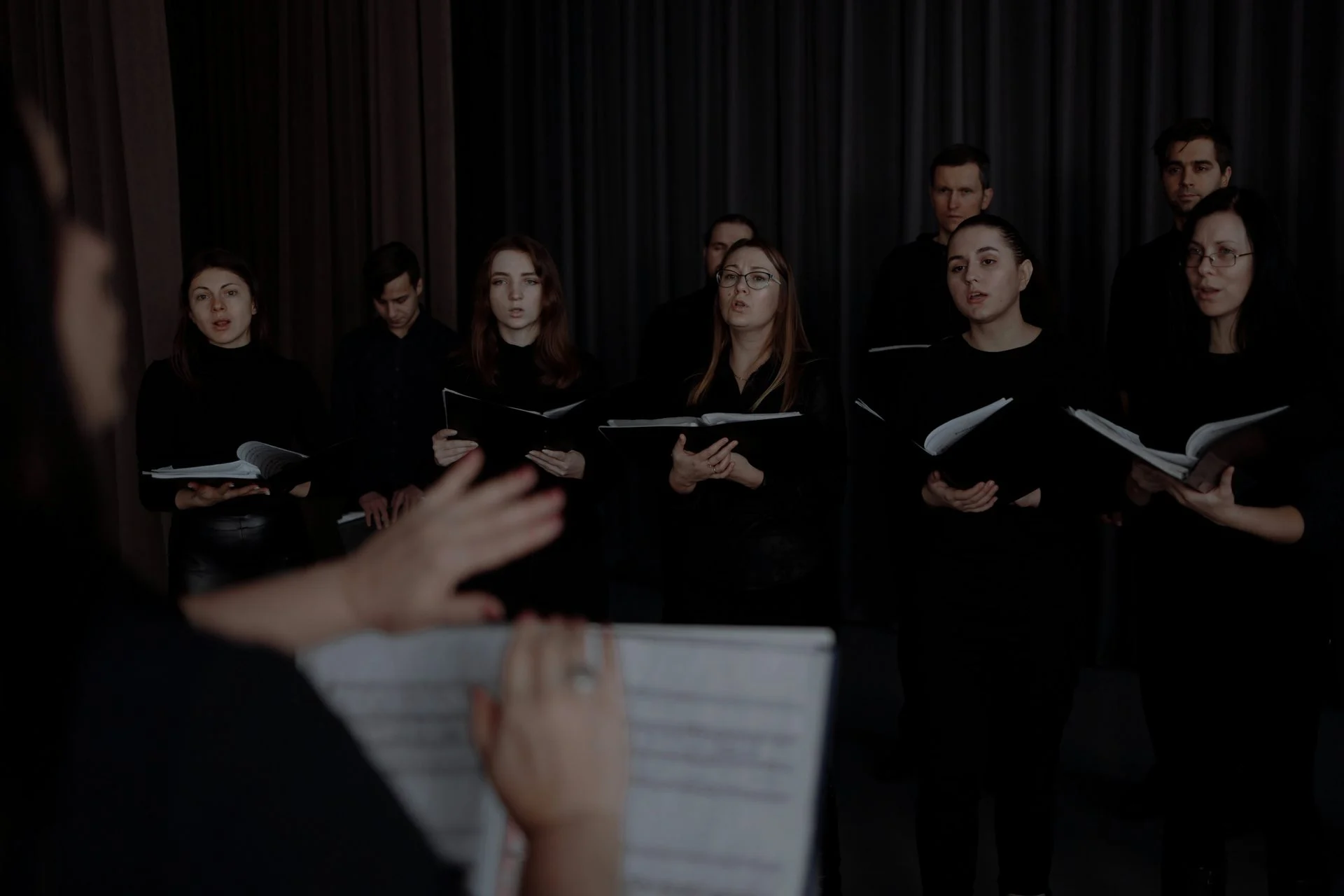 Conductor leading an ensemble