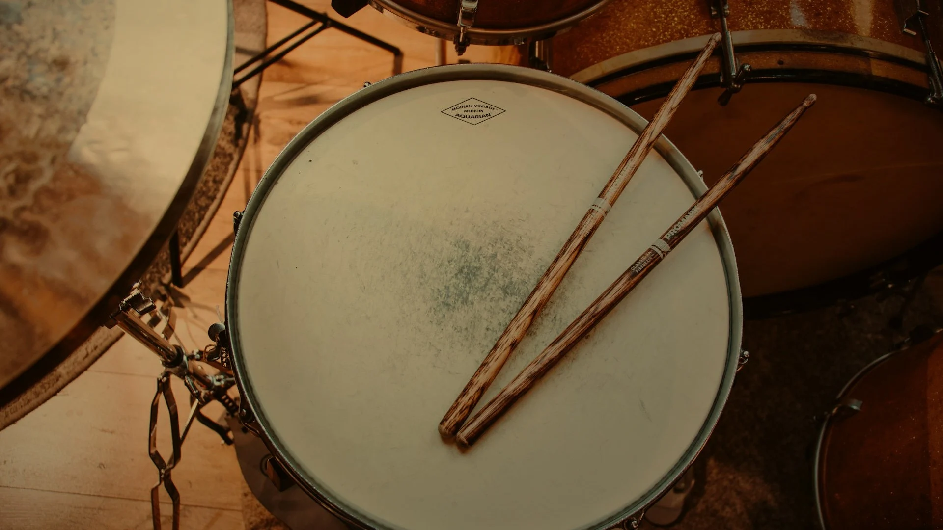 Musician performing on a drum kit
