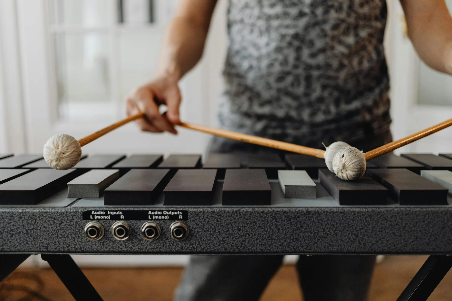 Musician performing on a vibraphone