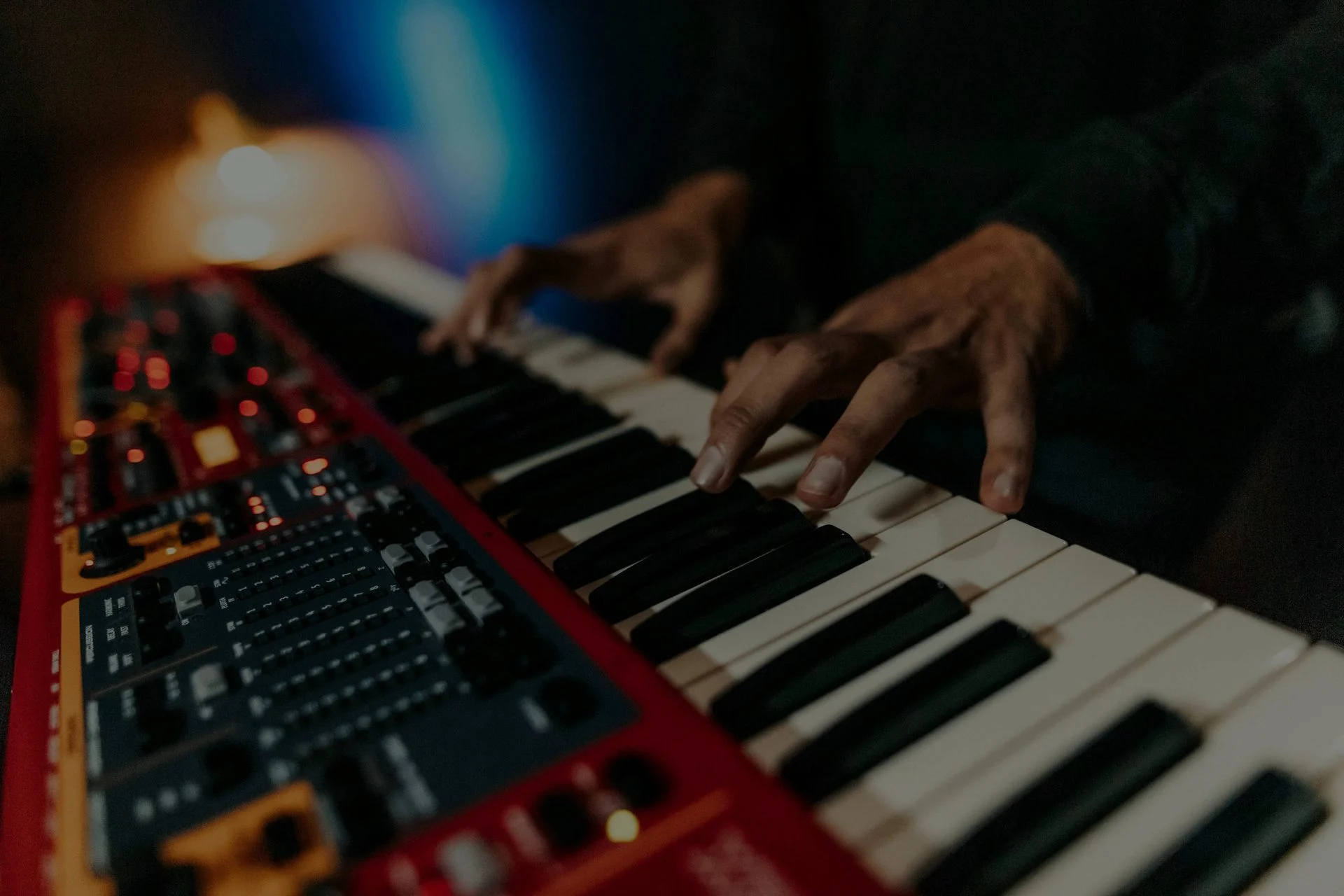 Musician performing on a synthesizer