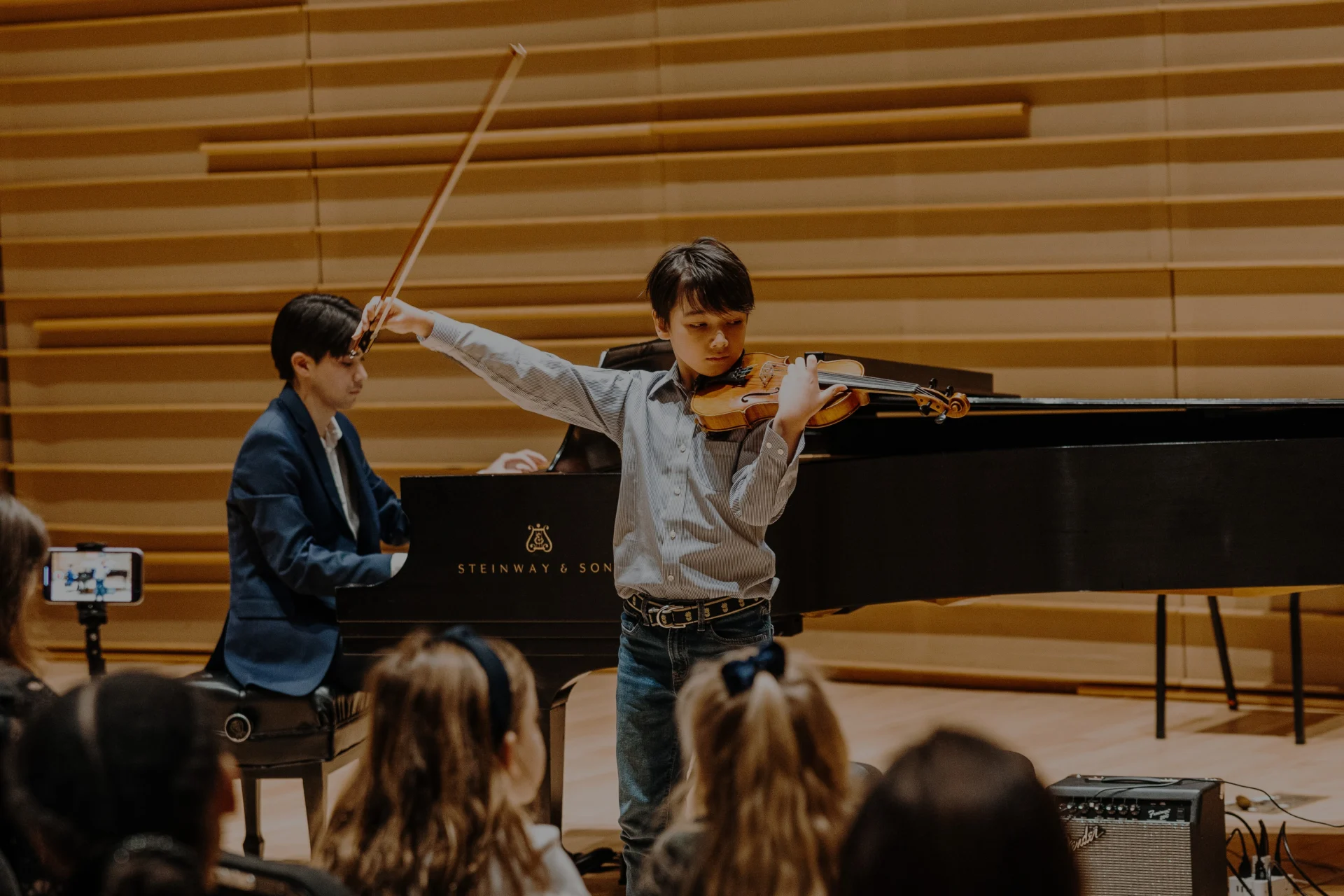 Musician performing on a violin