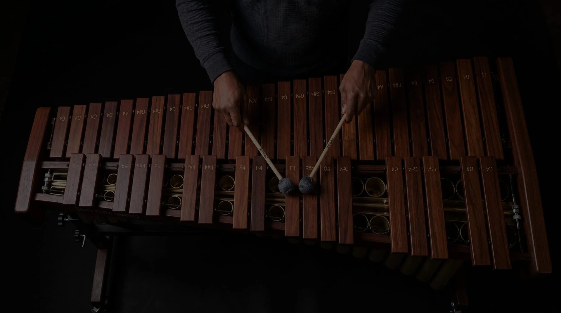 Musician performing on a marimba