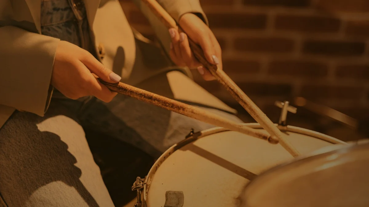 Close-up of a drum kit being played