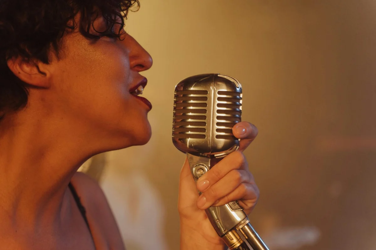 Close-up of a vocalist singing into a microphone