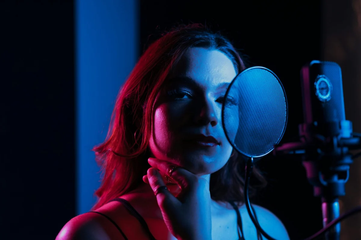 Close-up of a vocalist singing into a microphone