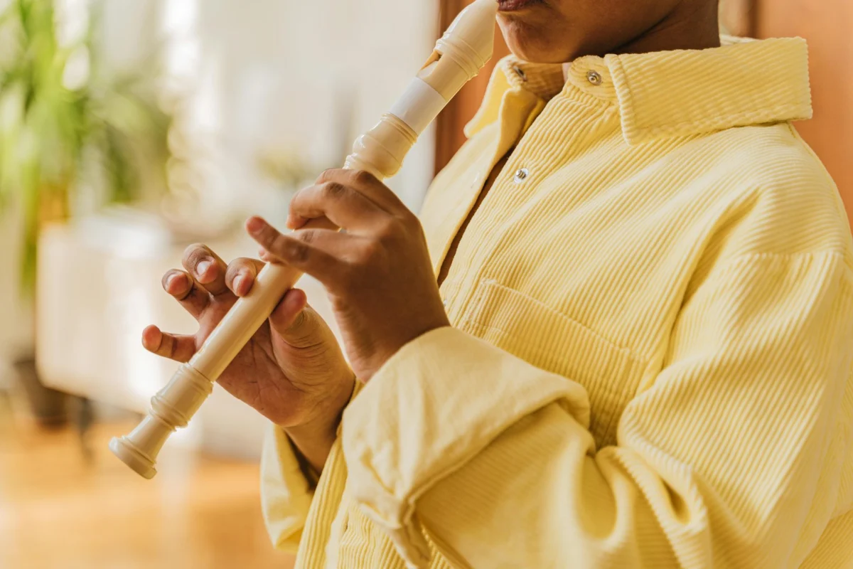 Close-up of a recorder being played