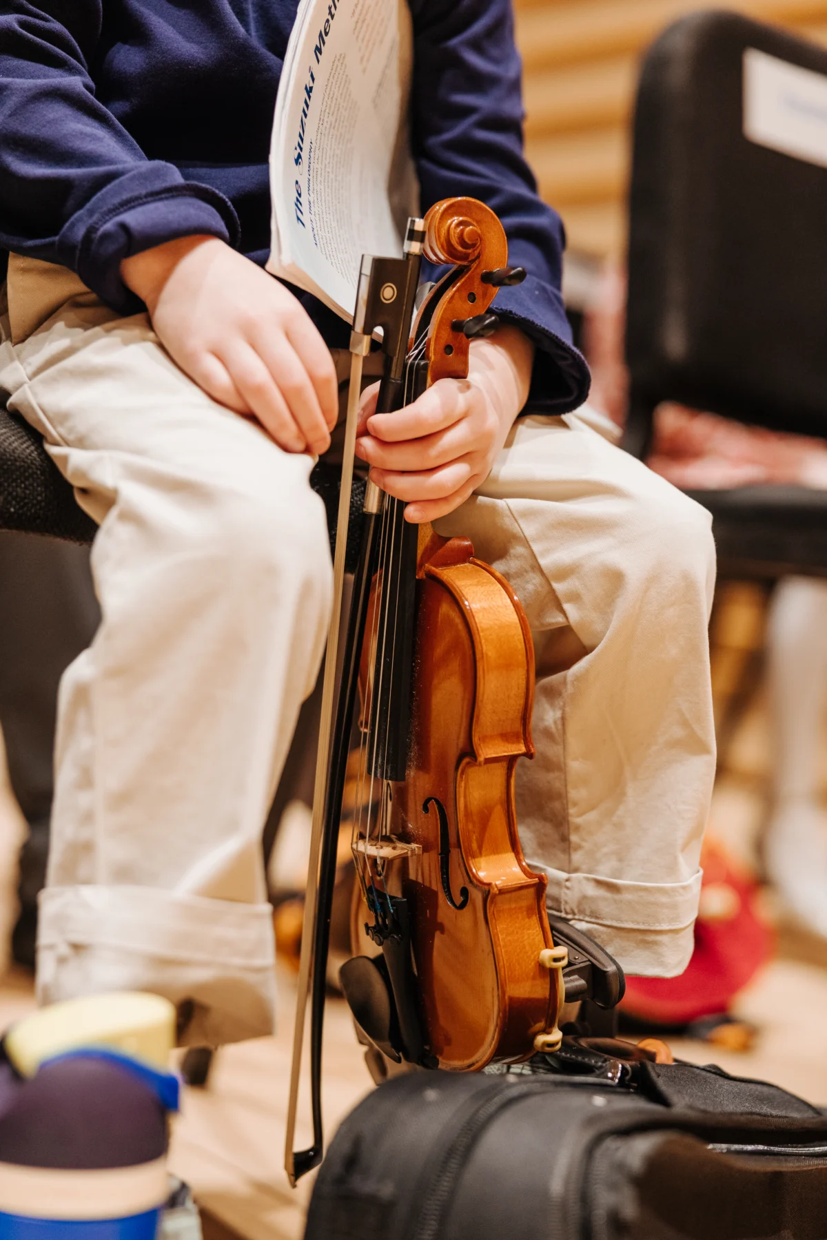 Close-up of a violin being played