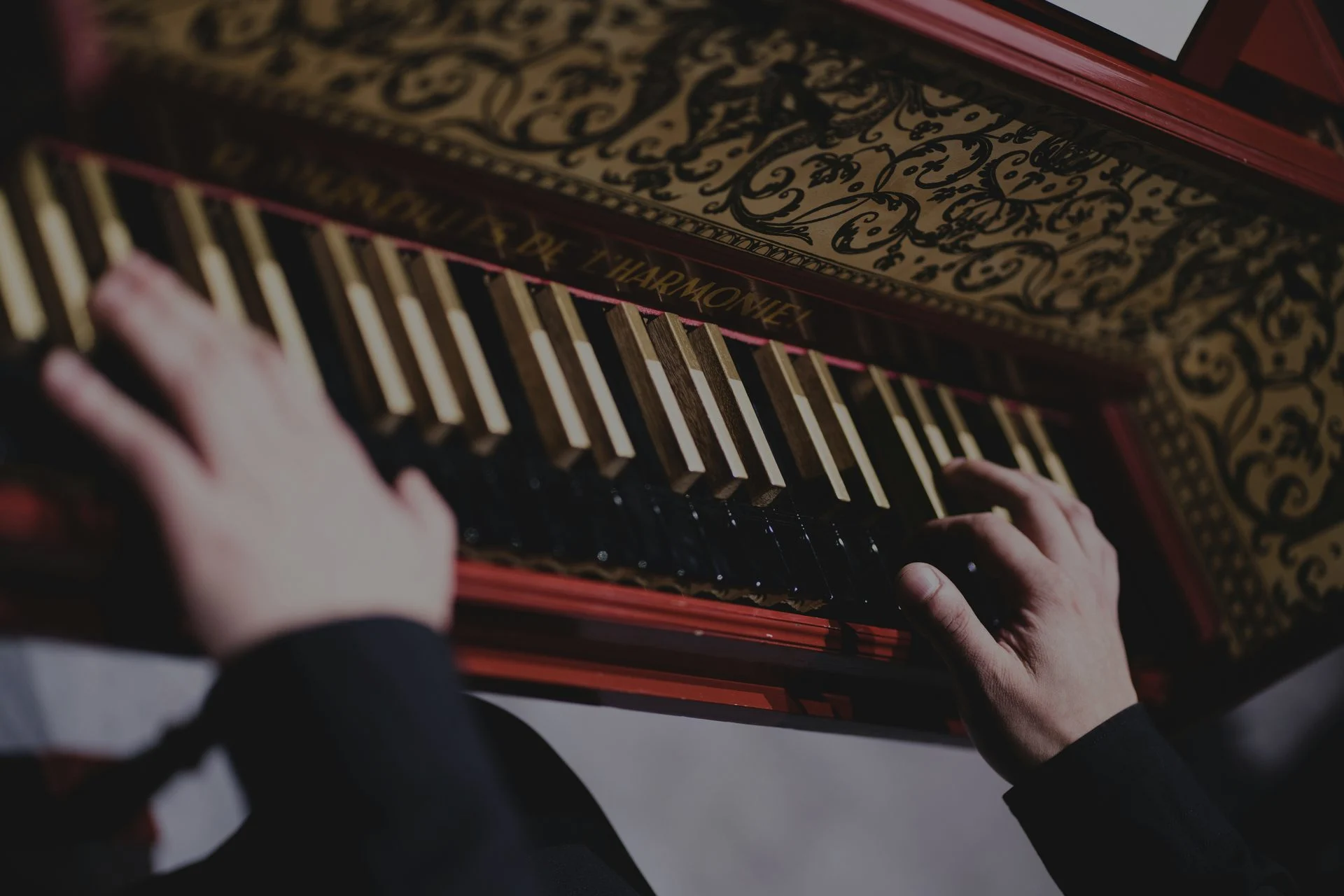 Harpsichord shown in a performance or practice setting