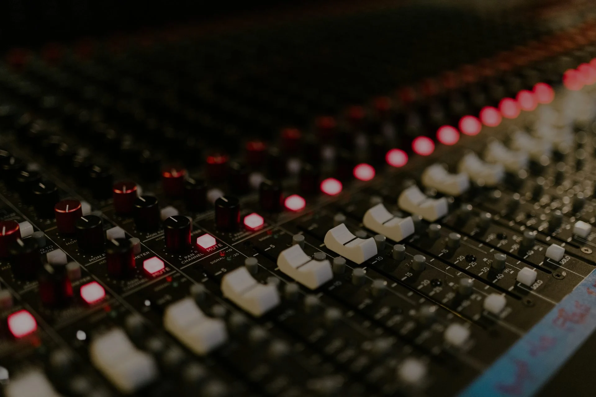 Recording studio with monitors, outboard gear, and a mixing desk