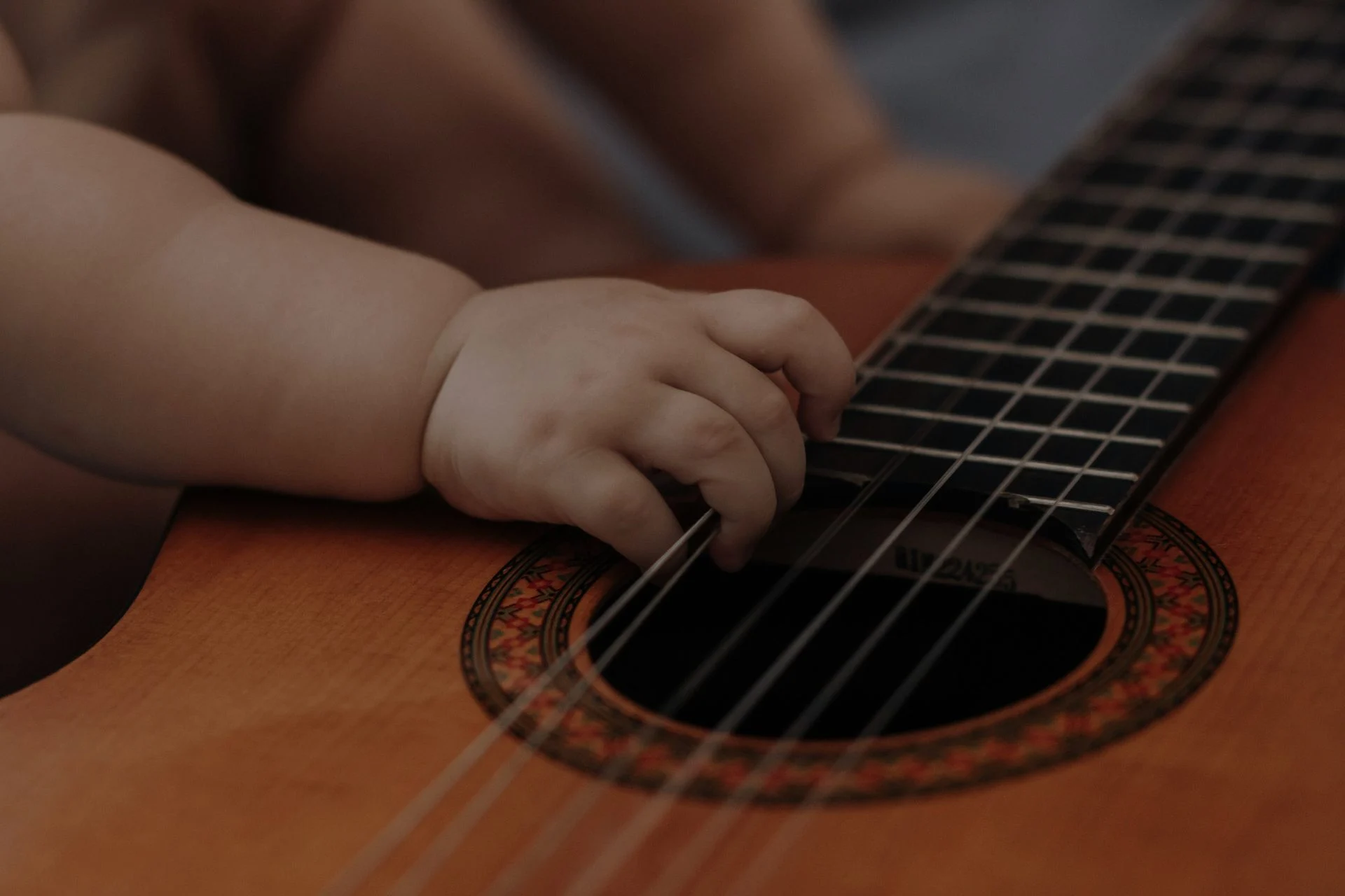 Bright music classroom with young children and instruments