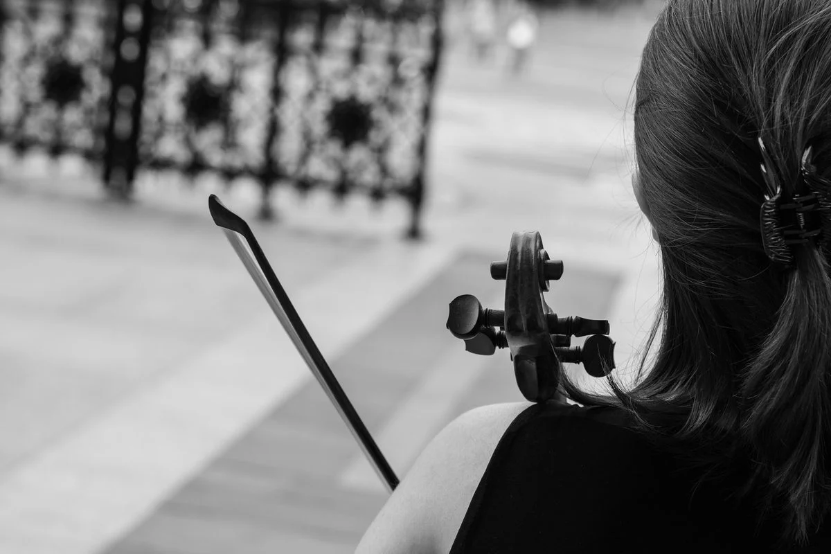 Cello lesson — student practicing with an instructor