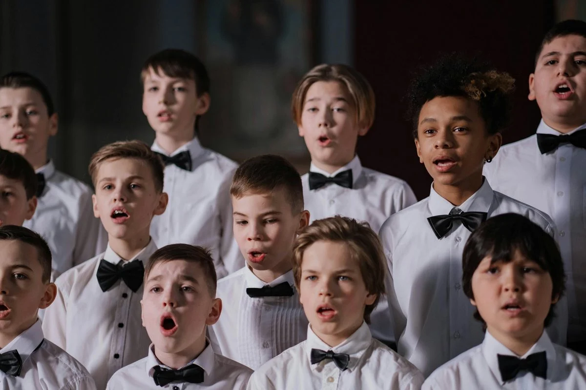 Choral Conducting lesson — student studying a score with an instructor