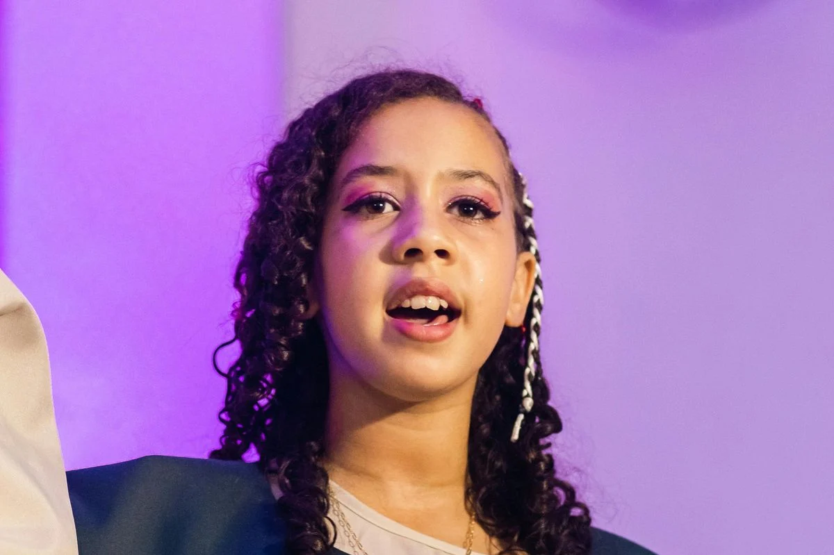Voice lesson — student practicing mezzo soprano technique with an instructor