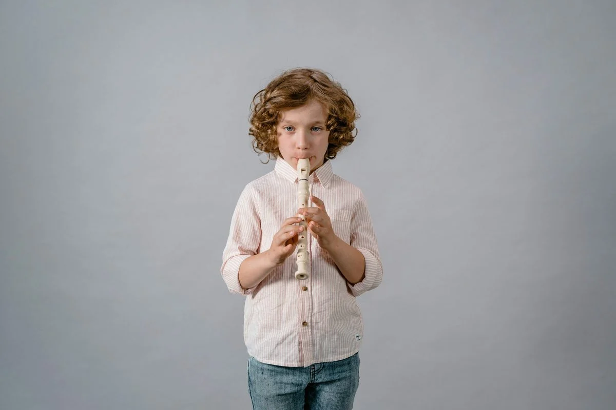 Recorder lesson — student practicing with an instructor