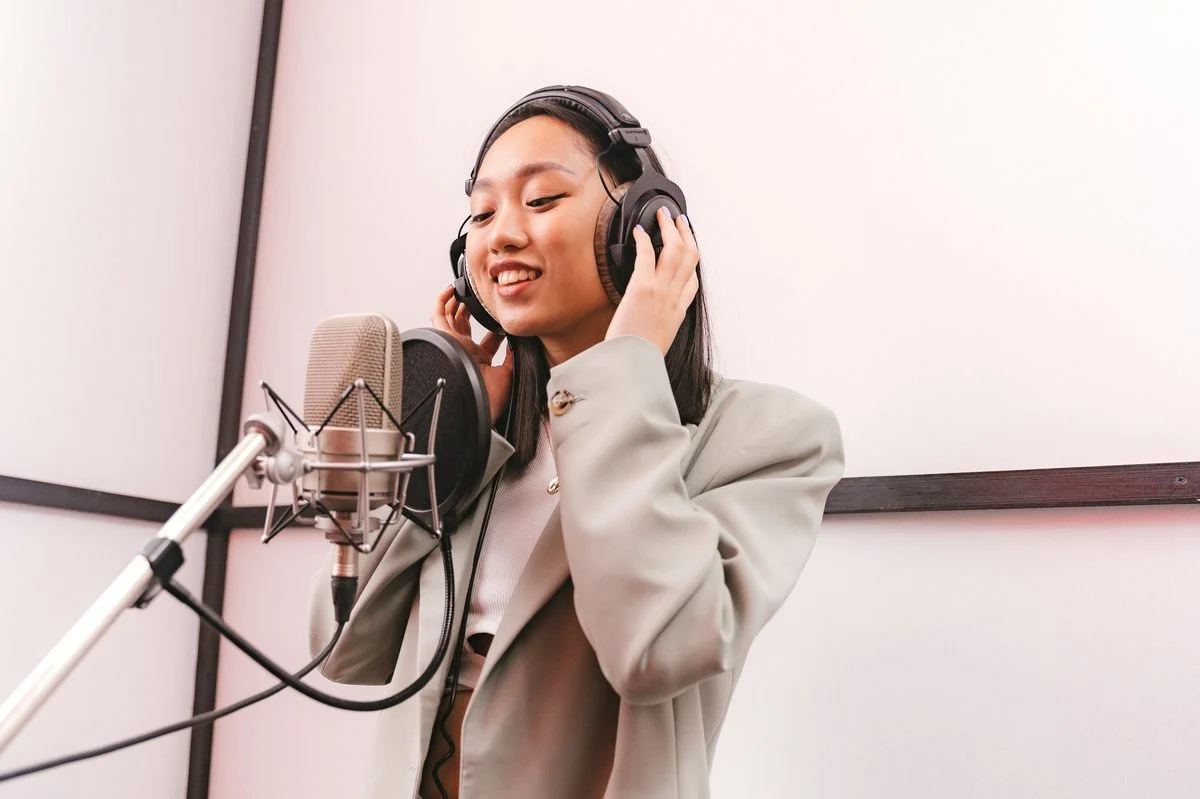 Recording Arts lesson — student and instructor at a studio workstation