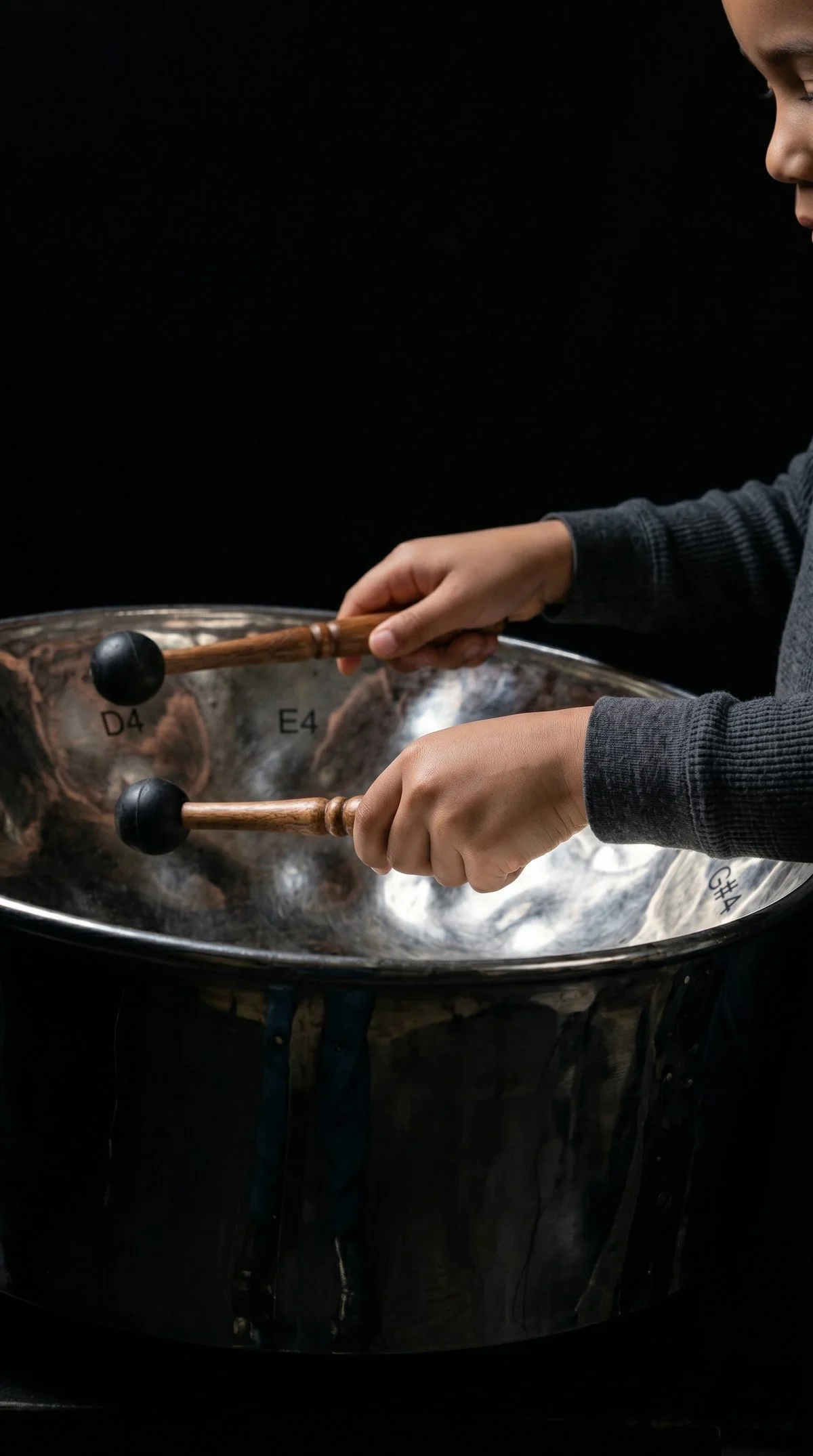 Steel Pan lesson — student practicing with an instructor