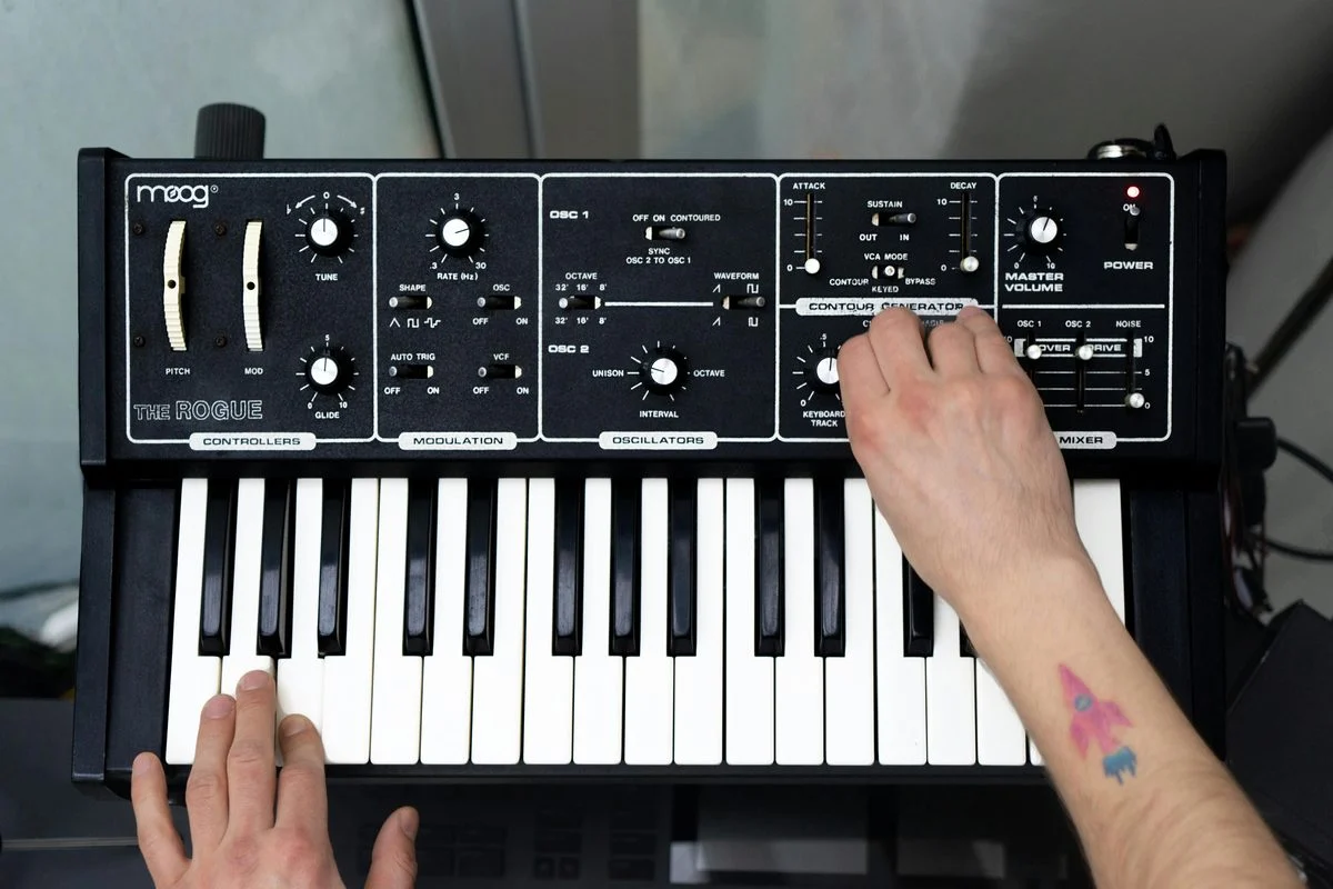 Synthesizer lesson — student practicing with an instructor