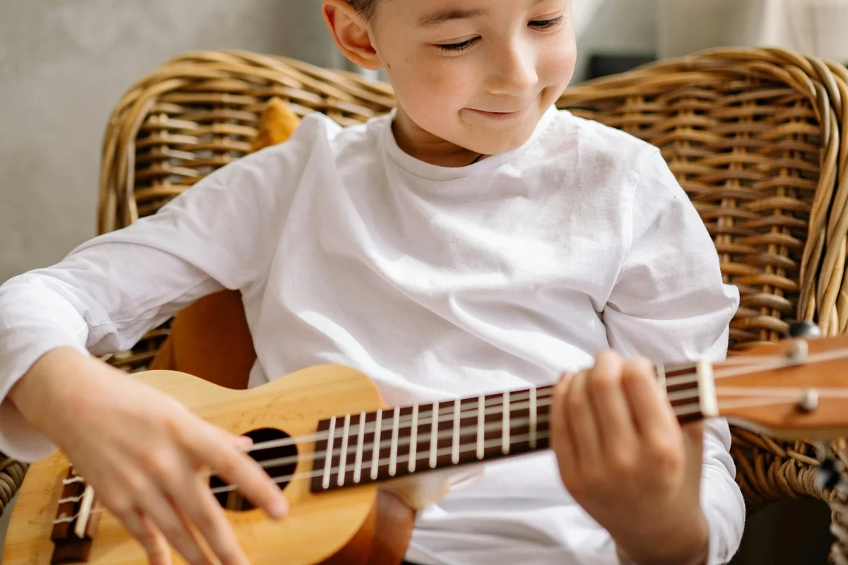 One-on-one ukulele lesson in a home or studio setting