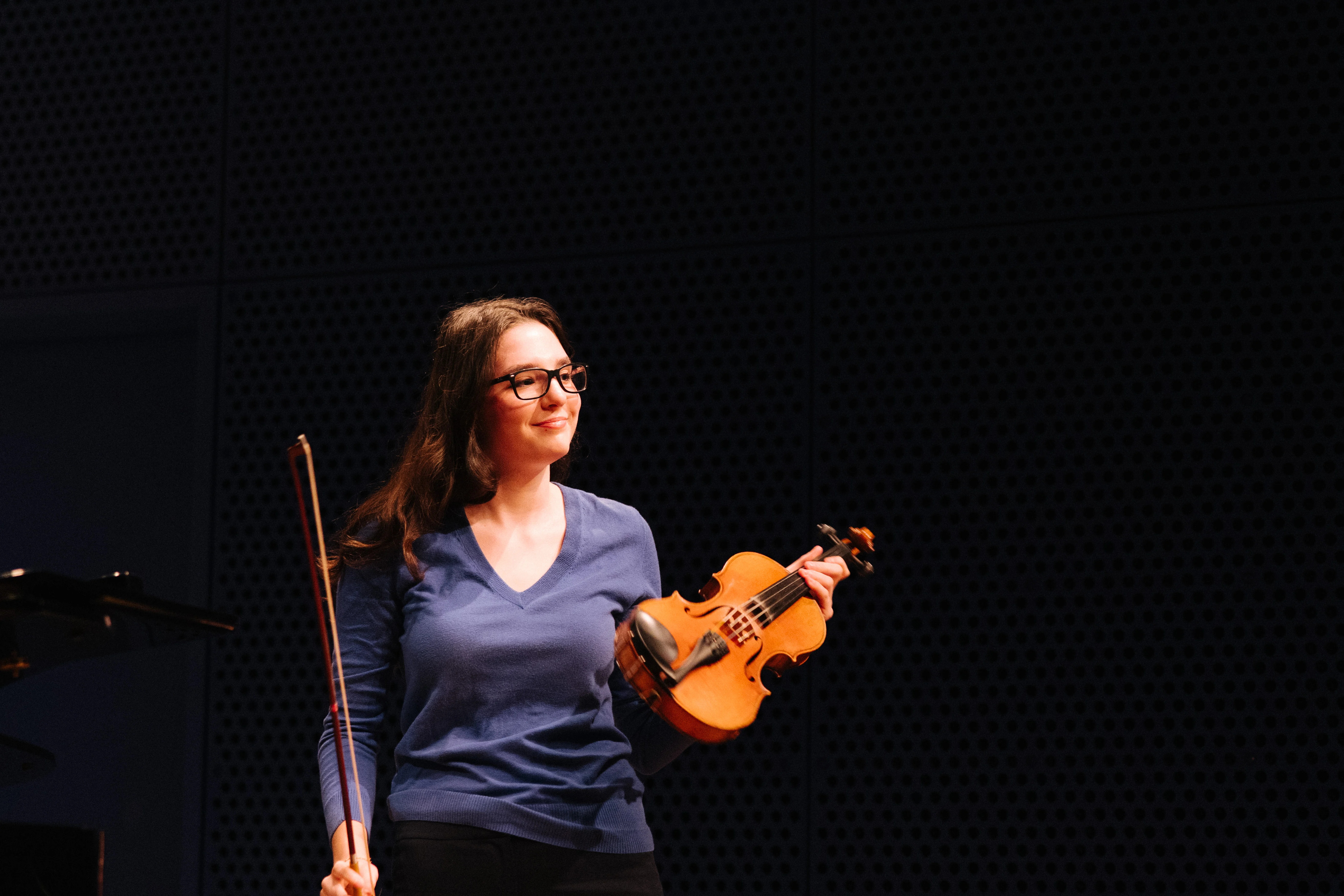One-on-one violin lesson in a home or studio setting