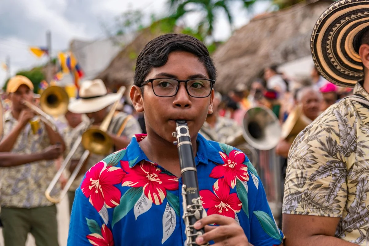 Clarinet teacher demonstrating technique for a student