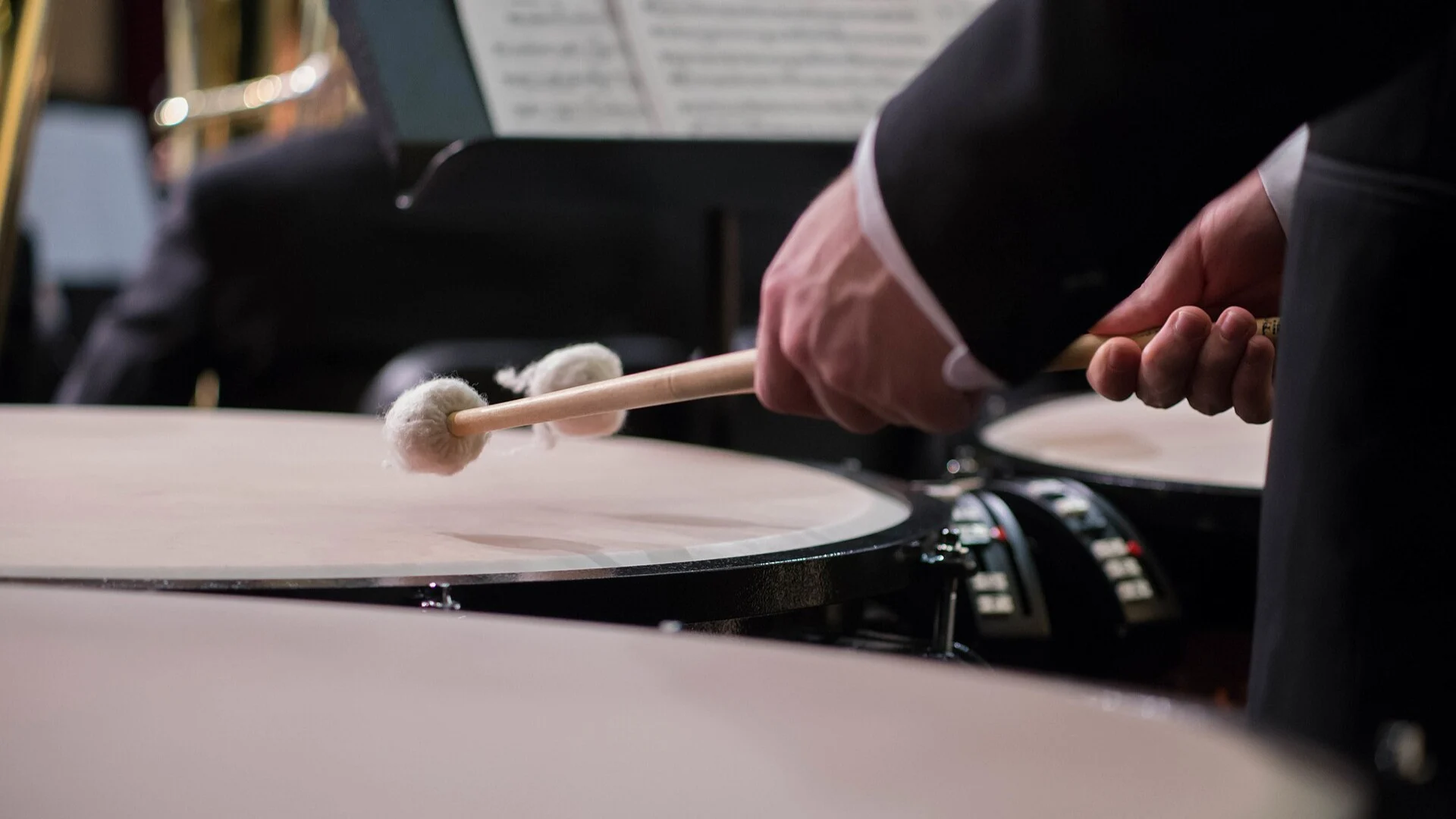 Timpani teacher demonstrating technique for a student