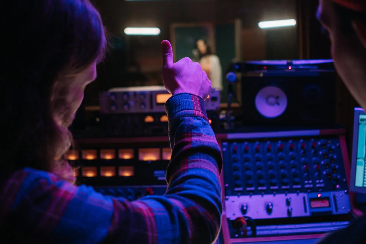 Production lesson in a home studio environment