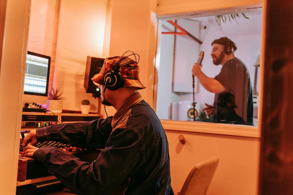 Production lesson in a home studio environment