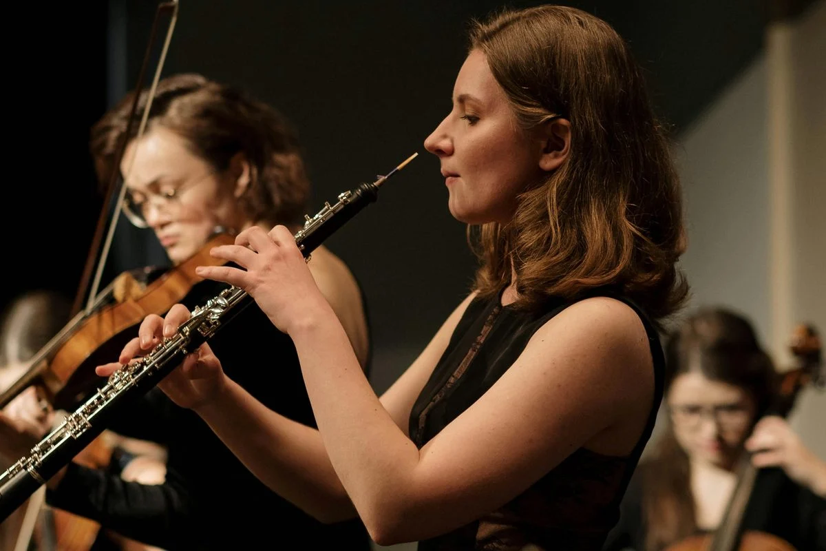 Student working through a oboe & english horn exercise with a coach