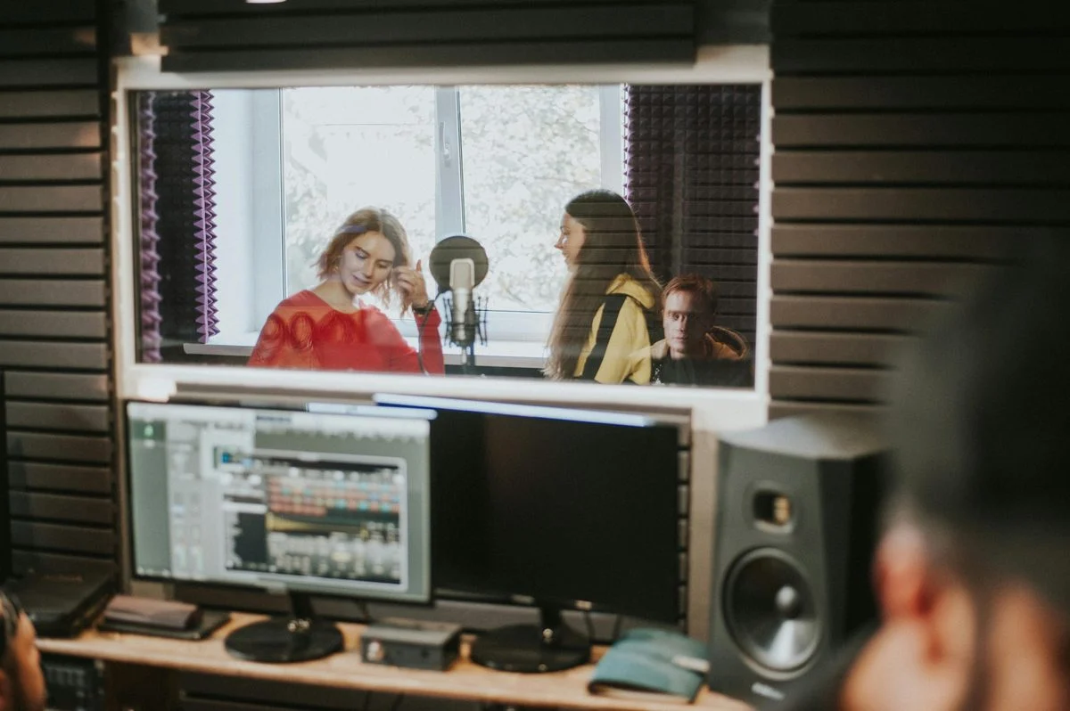 Production lesson in a home studio environment