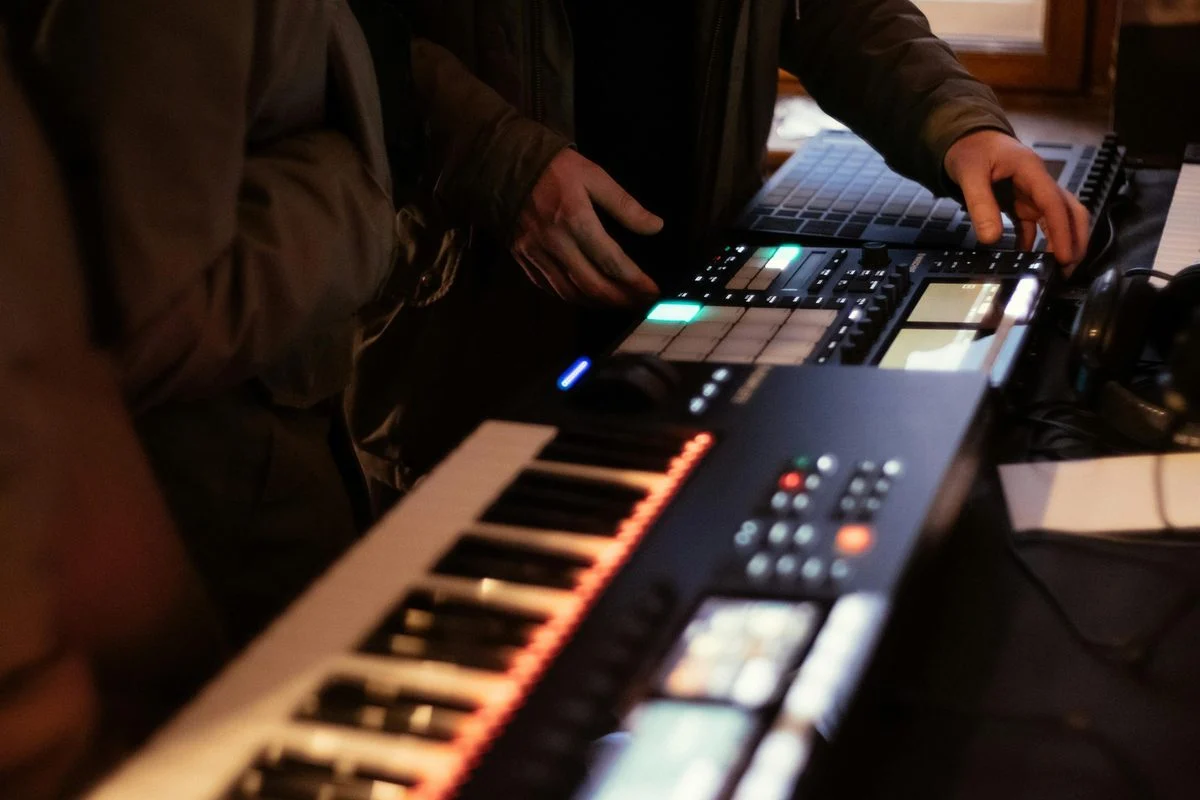 Production lesson in a home studio environment