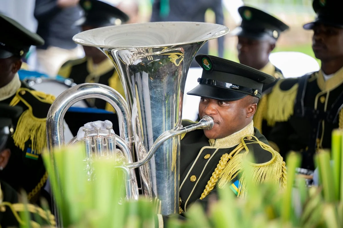 Student working through a tuba exercise with a coach